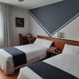 Habitación Estándar con 2 Camas Individuales